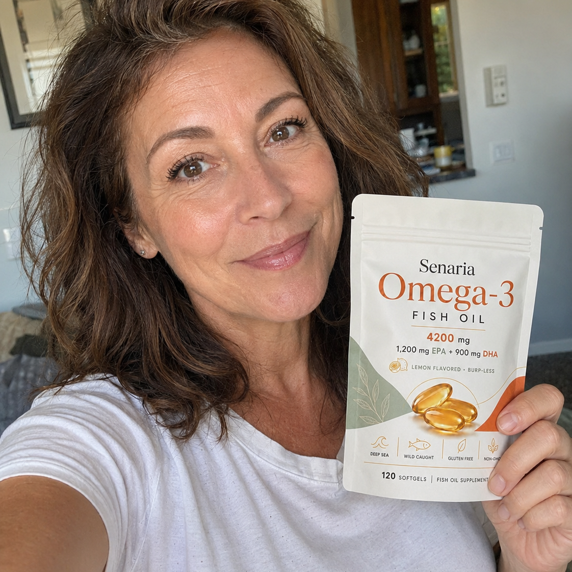 Woman holding Senaria Omega-3 Fish Oil pouch